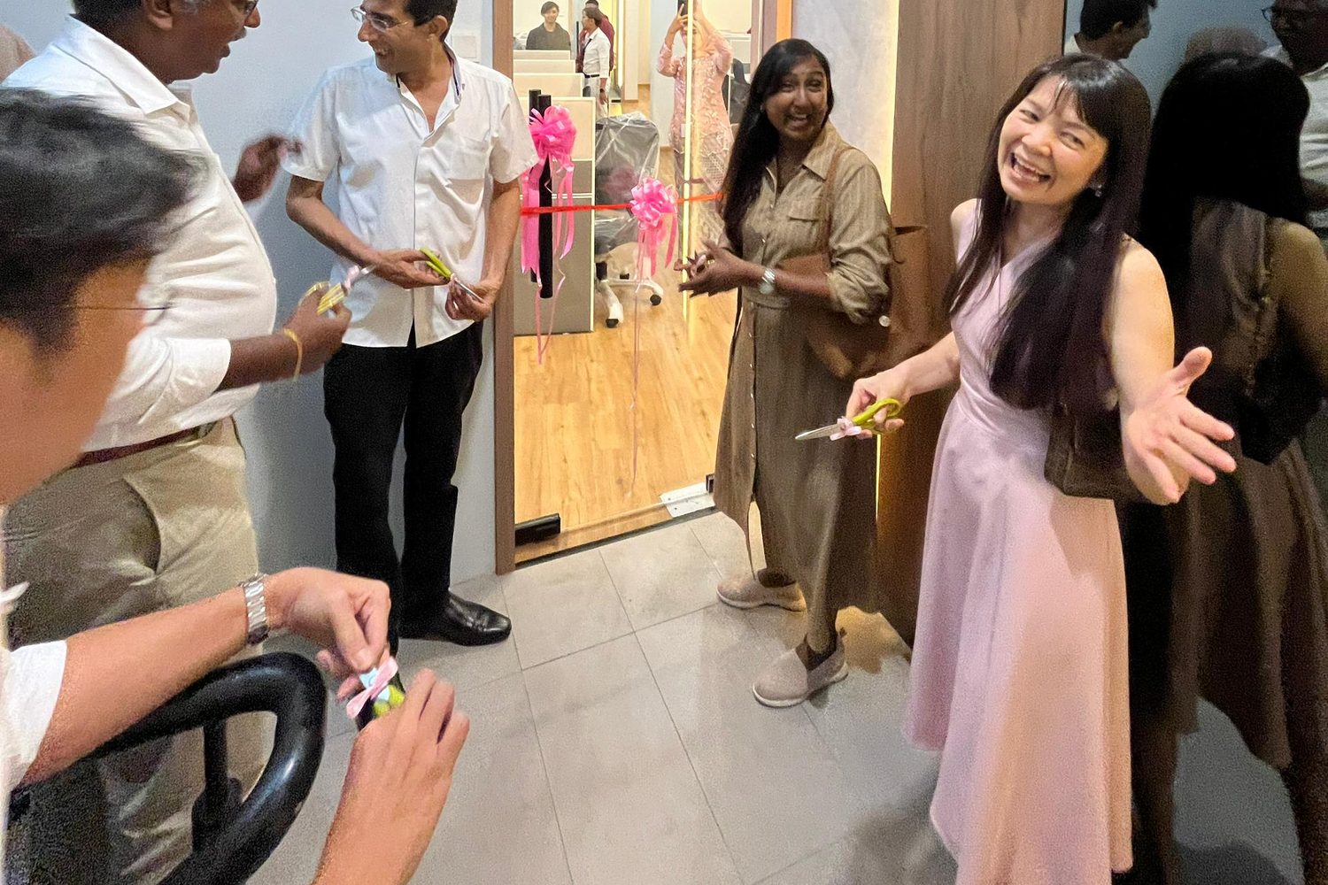 A second ribbon is cut at the entrance to the operations floor